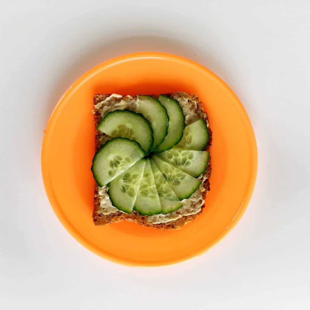 Healthy toast topping ideas for children, hummus and cucumber