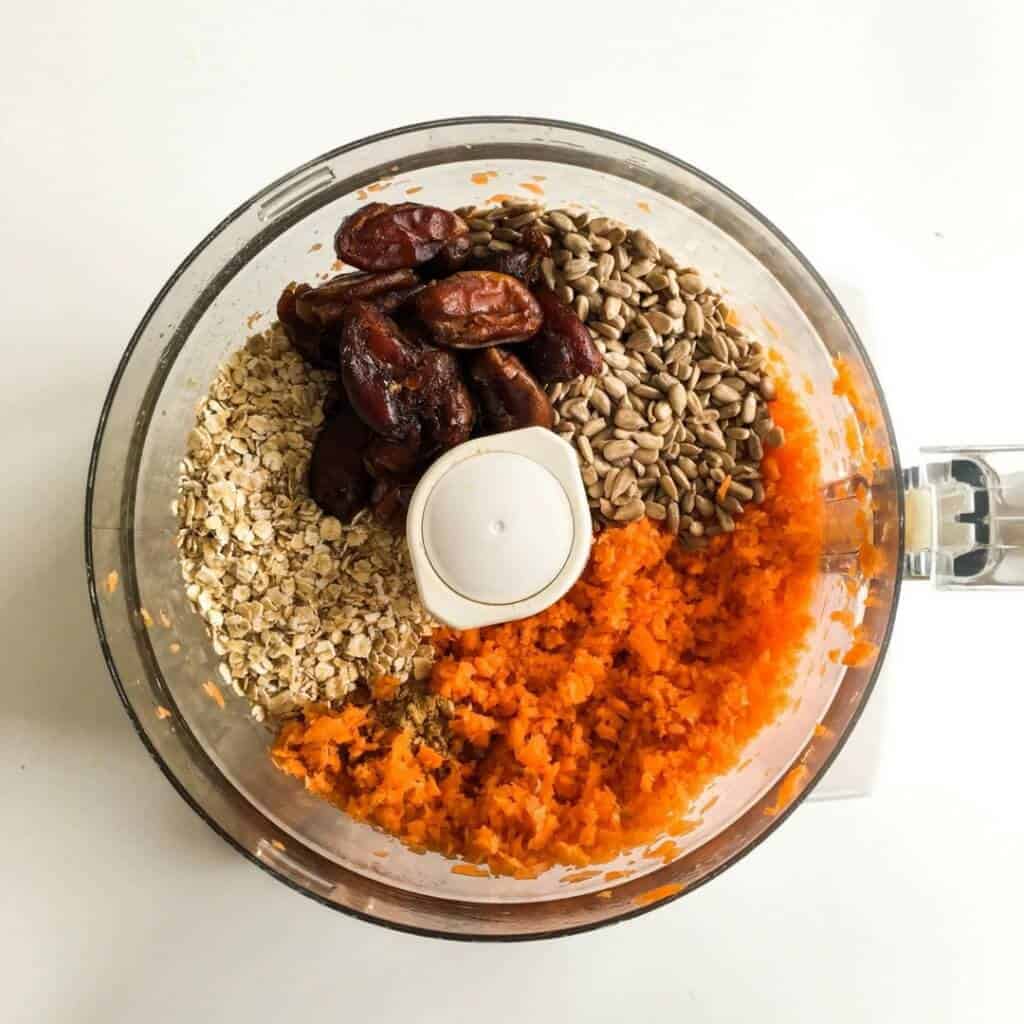 Ingredients for the carrot bliss balls in a food processor