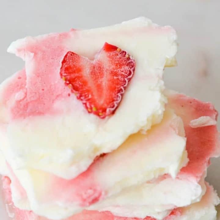 strawberry swirl frozen yogurt bark is a healthy summer low sugar treat. Perfect for kids and a non candy valentines idea