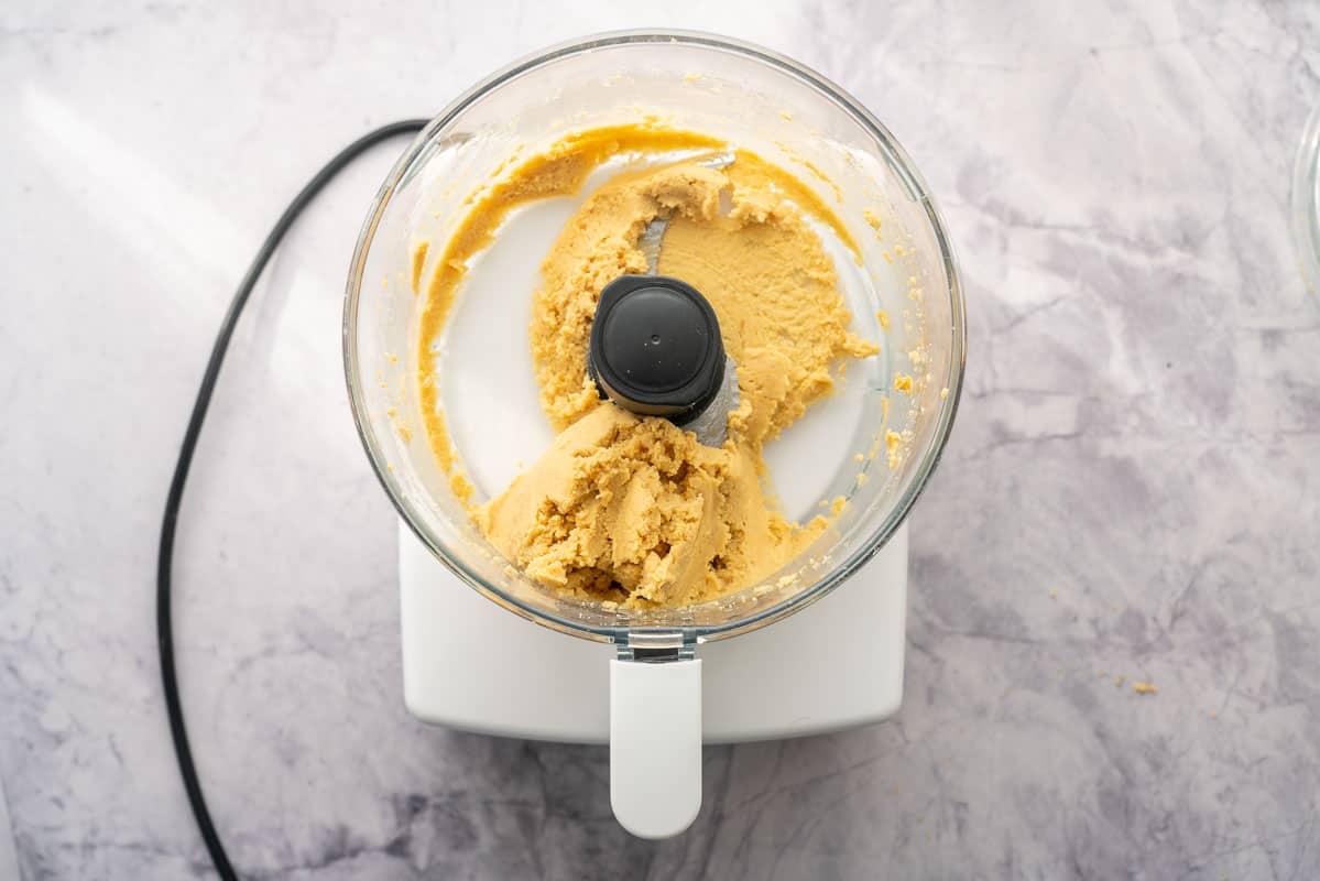 Smooth chickpea paste in a food processor.