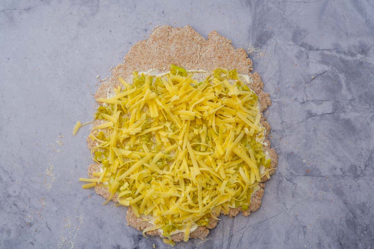 Wholemeal pizza dough topped with leeks and cheese. 