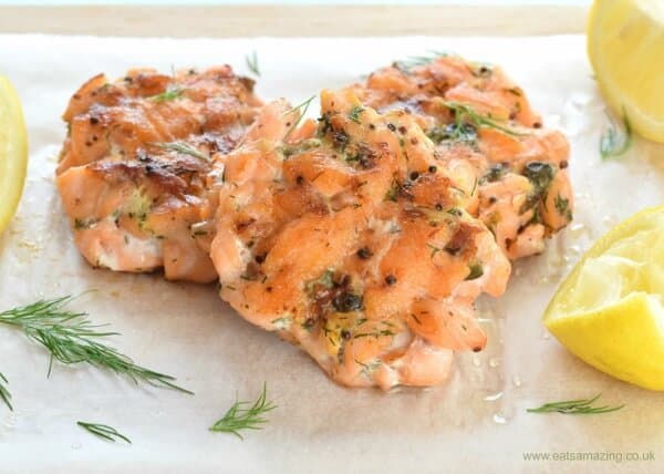 Three salmon fishcakes on plate.