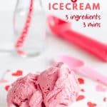 bowl of strawberry vegan ice cream on a red and white napkin