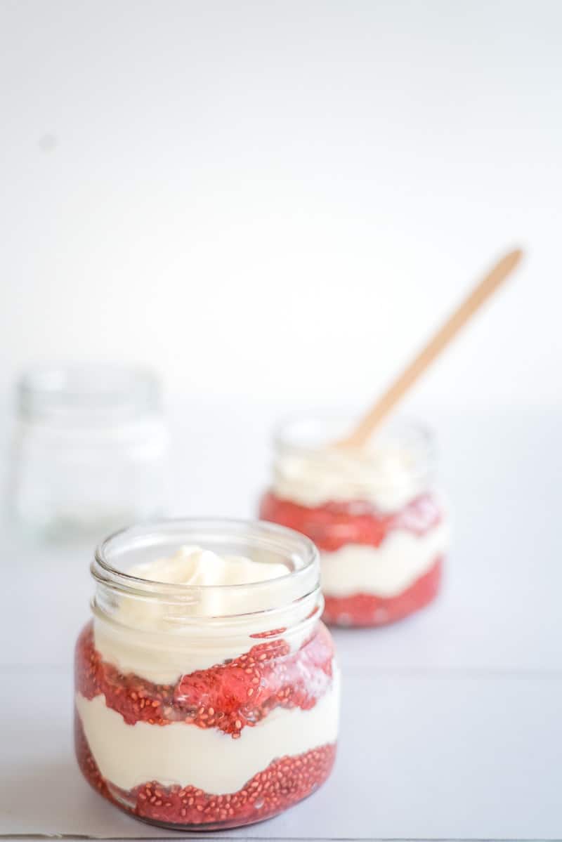 strawberry chia yoghurt parfaits layered in a jar