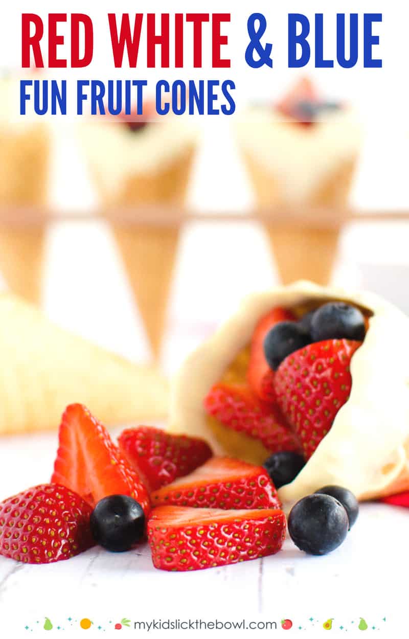 Red white and blue cone, icecreamcone filled with red and blue berries lying on its side