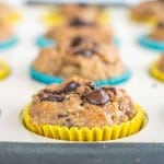 Healthy wholemeal banana zucchini muffins in a white muffin tray