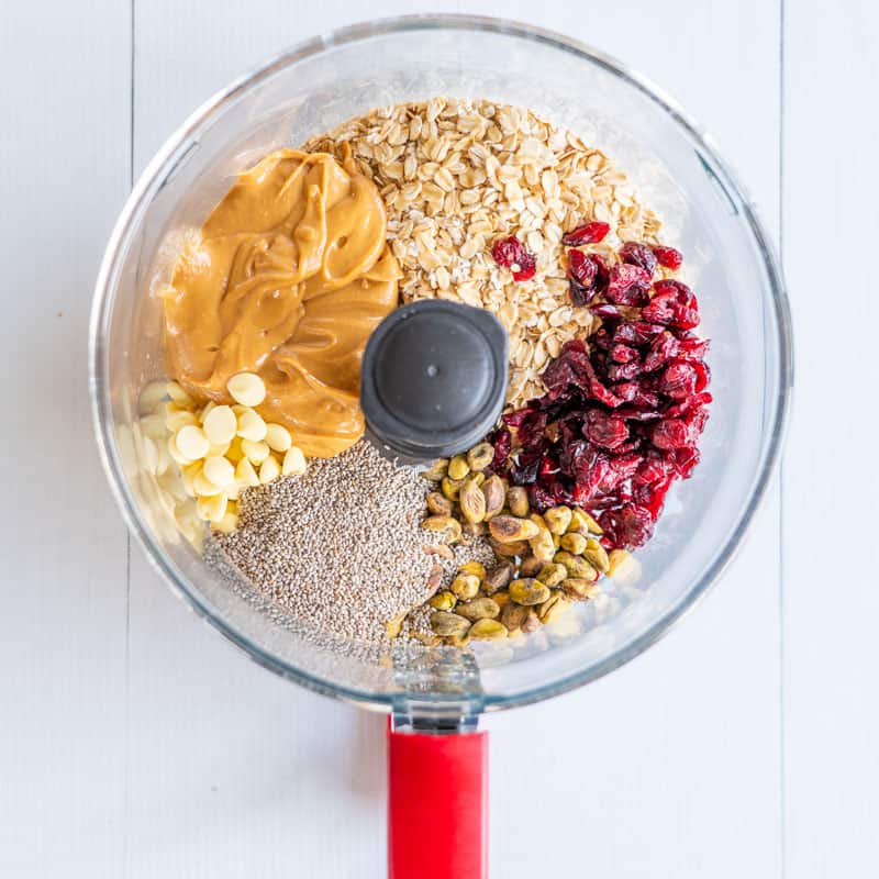 Cranberry Pistachio Energy bites ingredients in a food processor