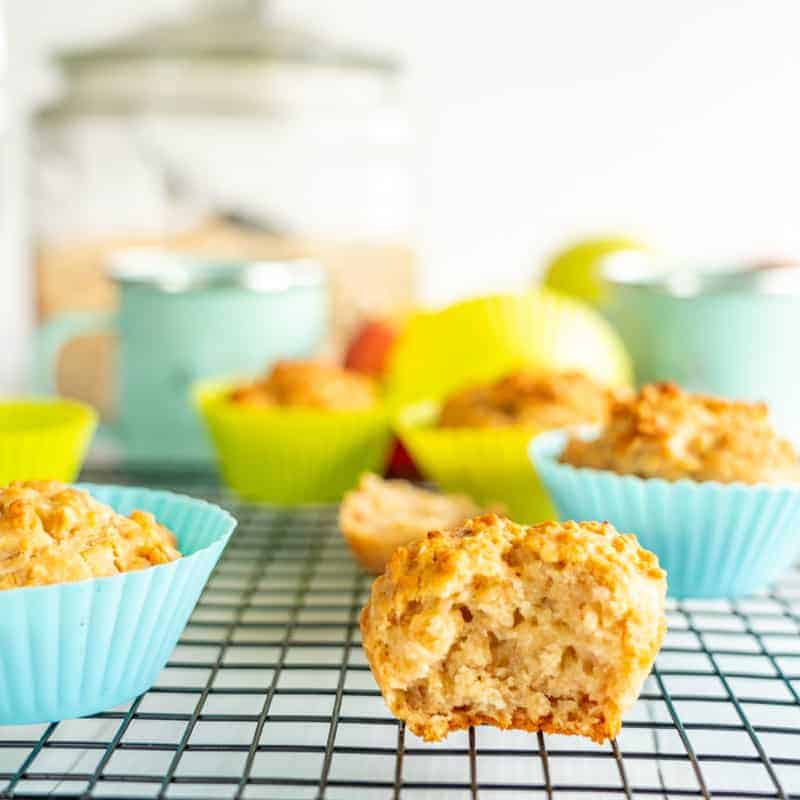 Healthy apple cinnamon muffin on a cooling rack