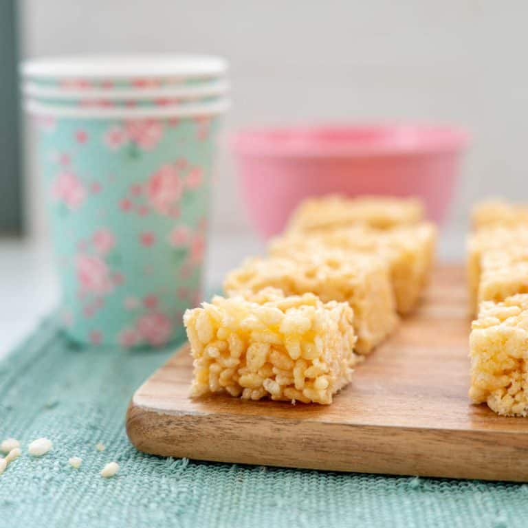 pieces of rice bubble slice on wooden board