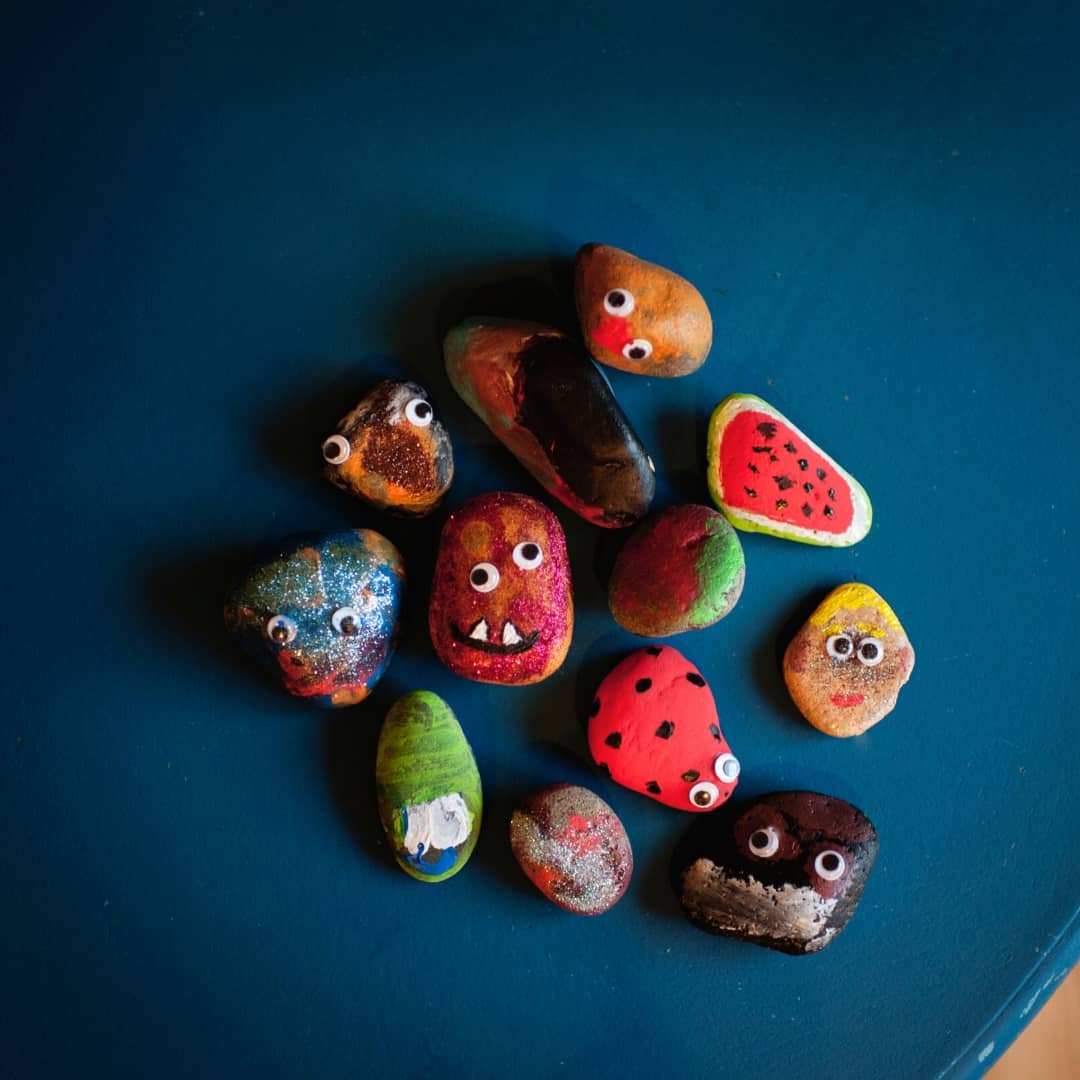 a collection of brightly painted rocks