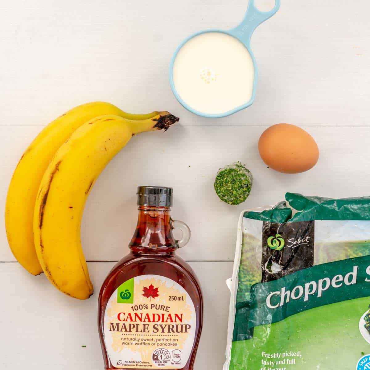 Wet Ingredients for the spinach muffins: Banana, maple syrup, milk, oil, frozen spinach egg