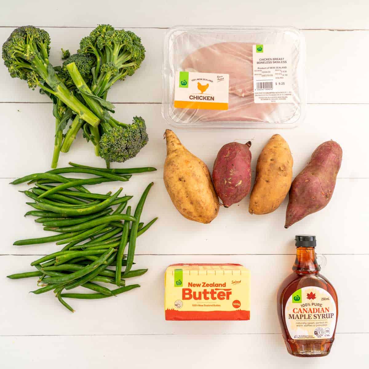 Green Vegetables (Broccoli Beans), Chicken, Kumara/Sweet Potato, Butter and Maple syrup laid out on a table