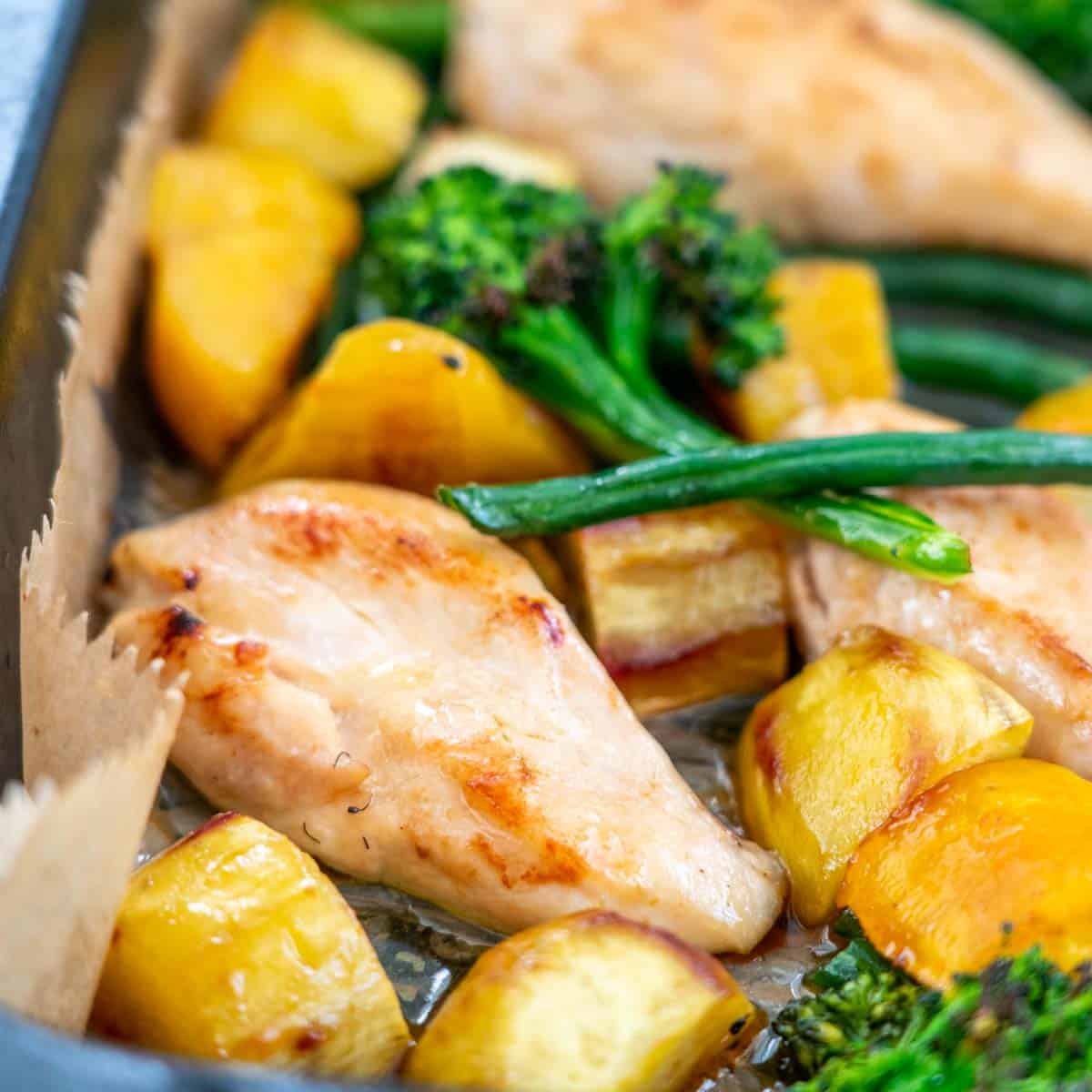 Chicken breast, sweet potato broccoli and beans baked with a maple caramel sauce in a large roasting dish