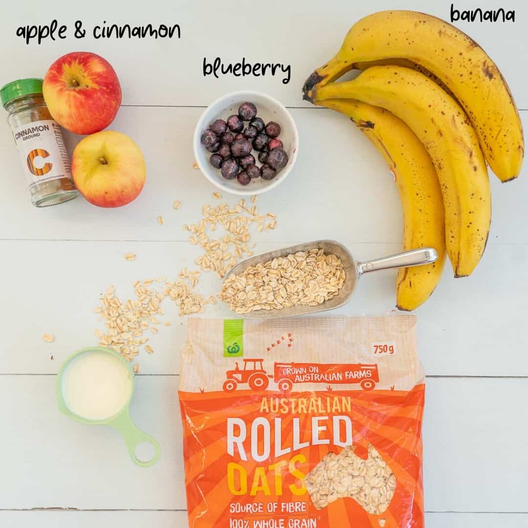 The ingredients for porridge fingers Rolled oats, milk, apple, cinnamon, blueberries ,banana