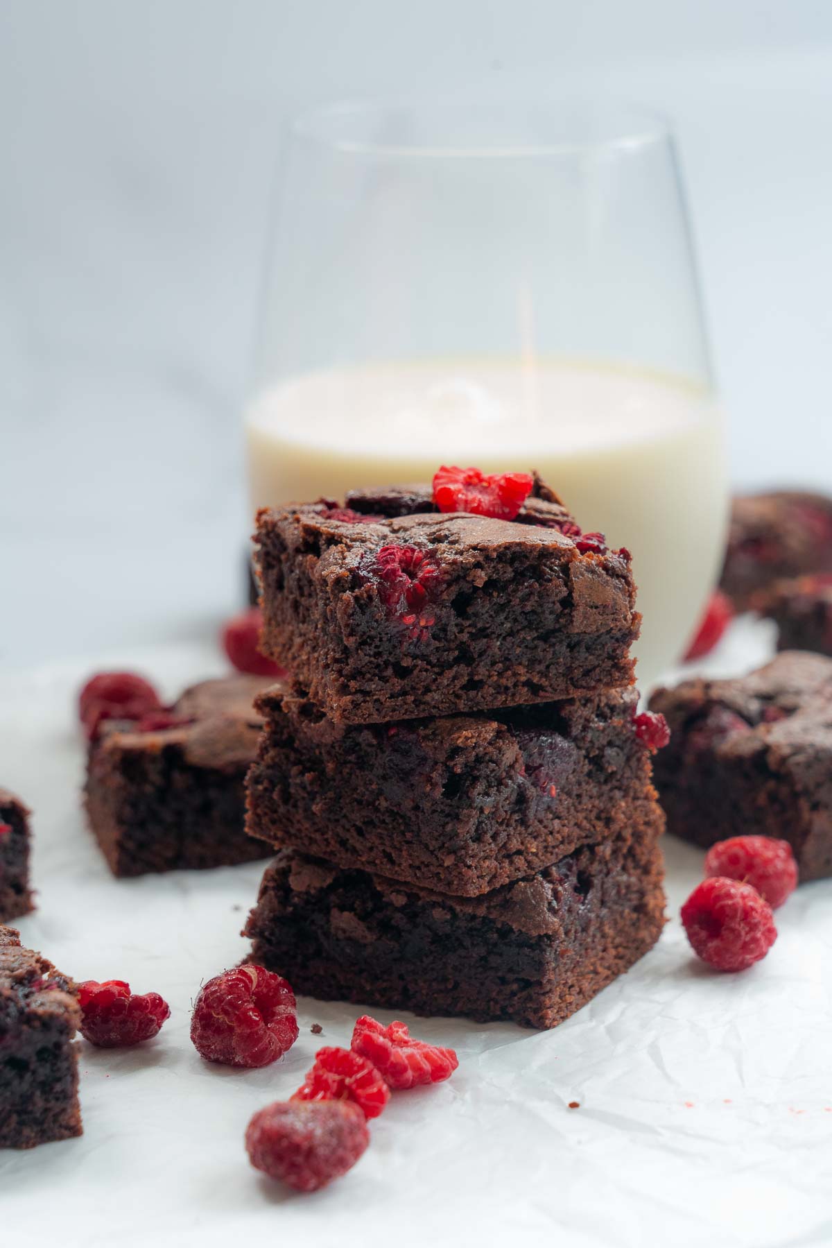 3 pieces of raspberry chocolate brownie stacked on top of each other