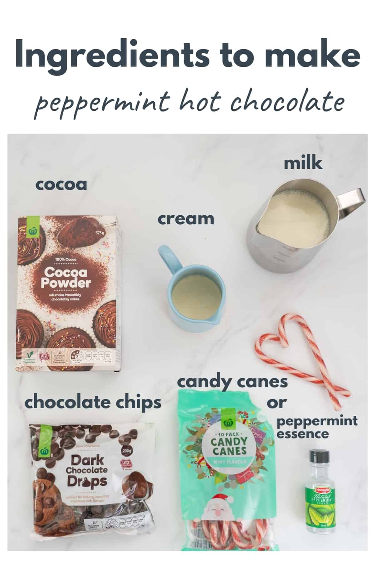 Ingredients to make peppermint hot chocolate laid out on a bench top with text overlay.