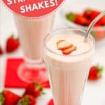 Two strawberry milkshakes in tall glasses topped with strawberry slice with red napkins with text overlay.