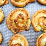 pinwheels laid out on an oven tray