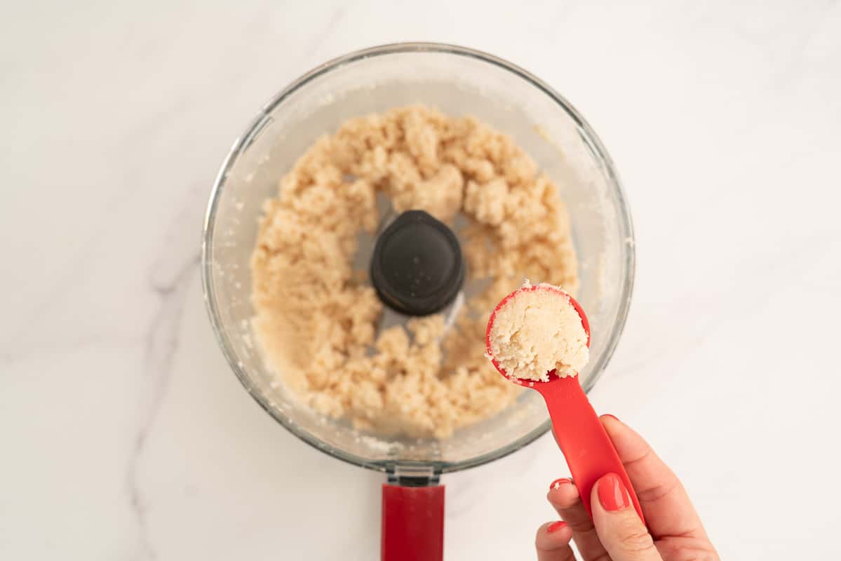 Tablespoon of coconut ball mix.