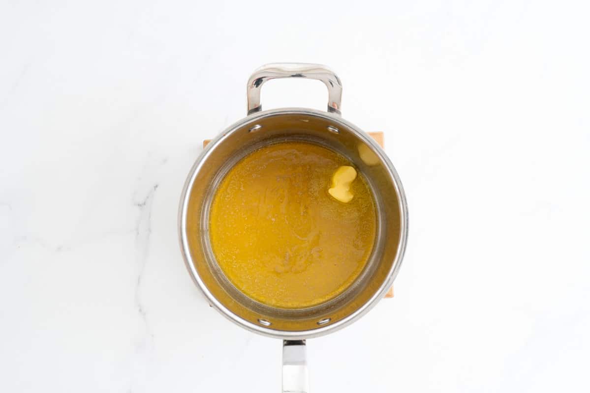 Butter and honey in the bottom of a large saucepan.