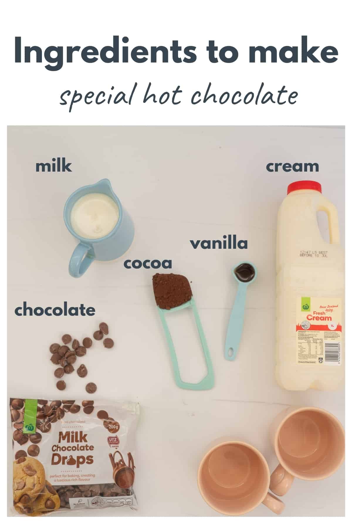 Ingredients to make the best hot chocolate laid out on a bench top with text overlay.
