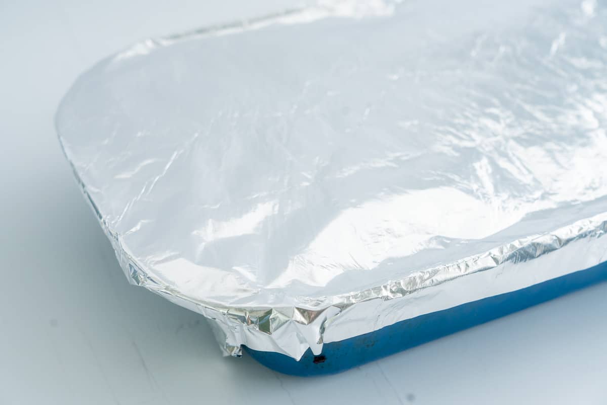Ceramic dish covered with foil.