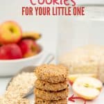 A stack of 5 oatmeal toddler cookies on a bench top with rolled oats and apples in the background with text overlay.