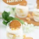 A layered dessert of yogurt, pears and gingernut biscuits in a glass with text overlay.