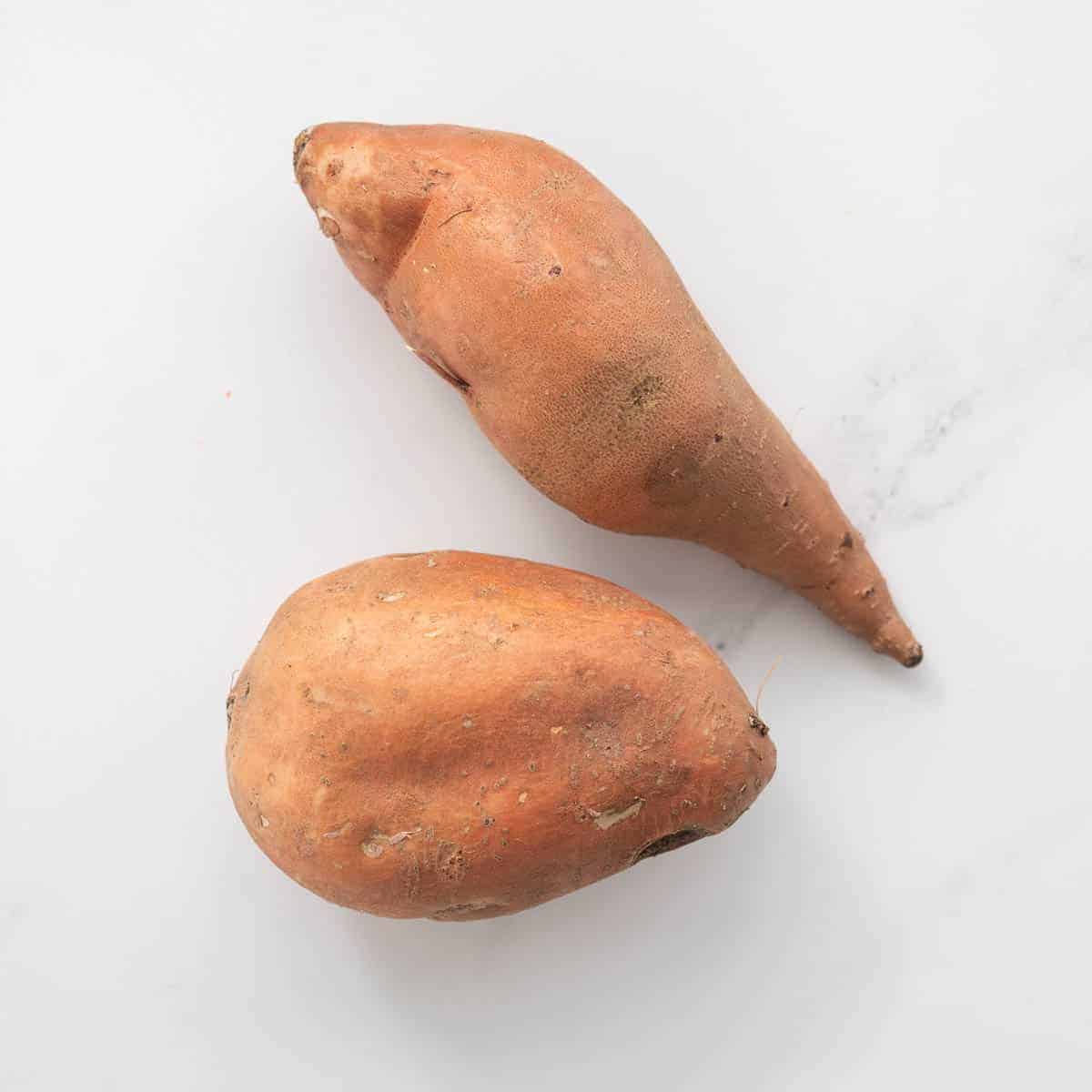 two whole sweet potato