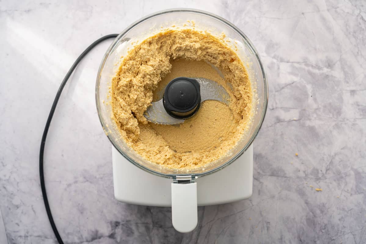 Chickpeas and oats blended together in a food processor.