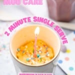 A cake in a mug decorated with a candle and sprinkles with text overlay for pinterest.