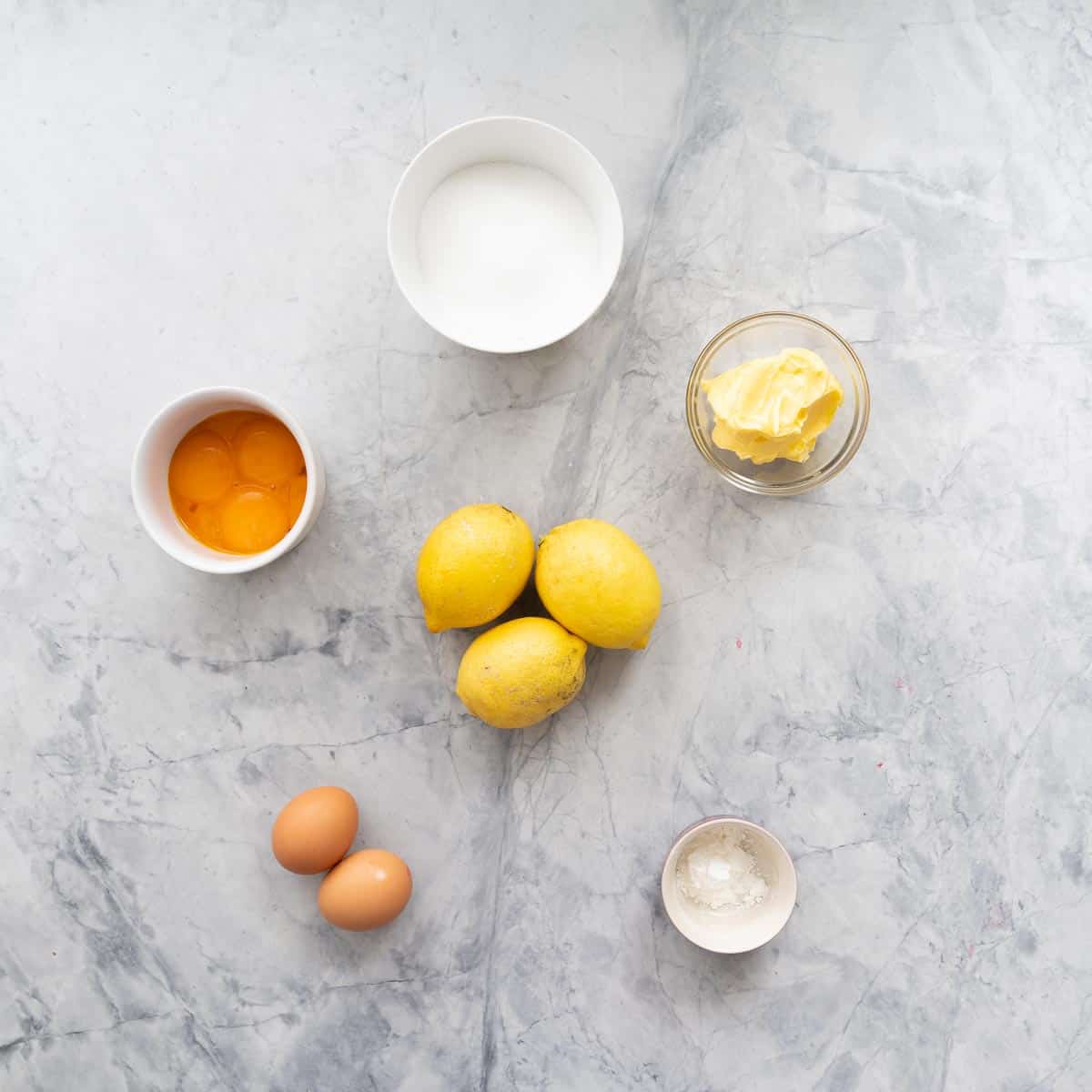 All the ingredients to make the Lemon Butter laid out on the bench 