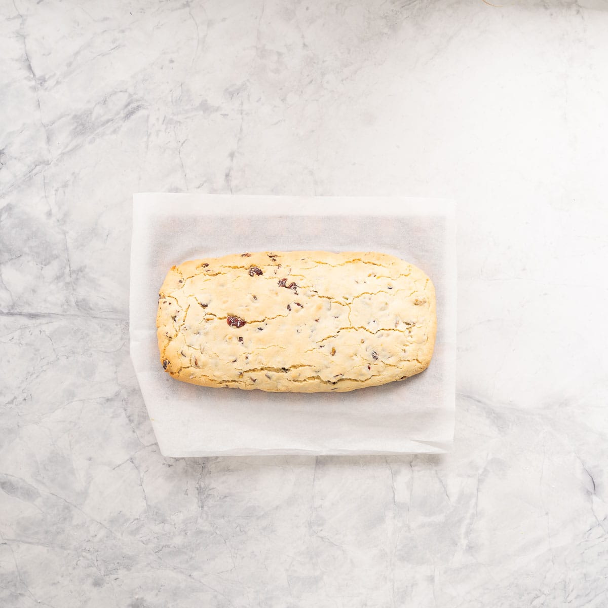 A large slab of baked biscotti dough.