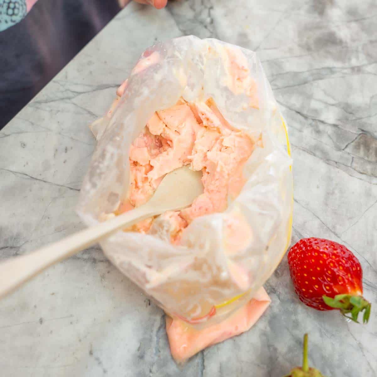 Strawberry ice cream in a zip lock bag.