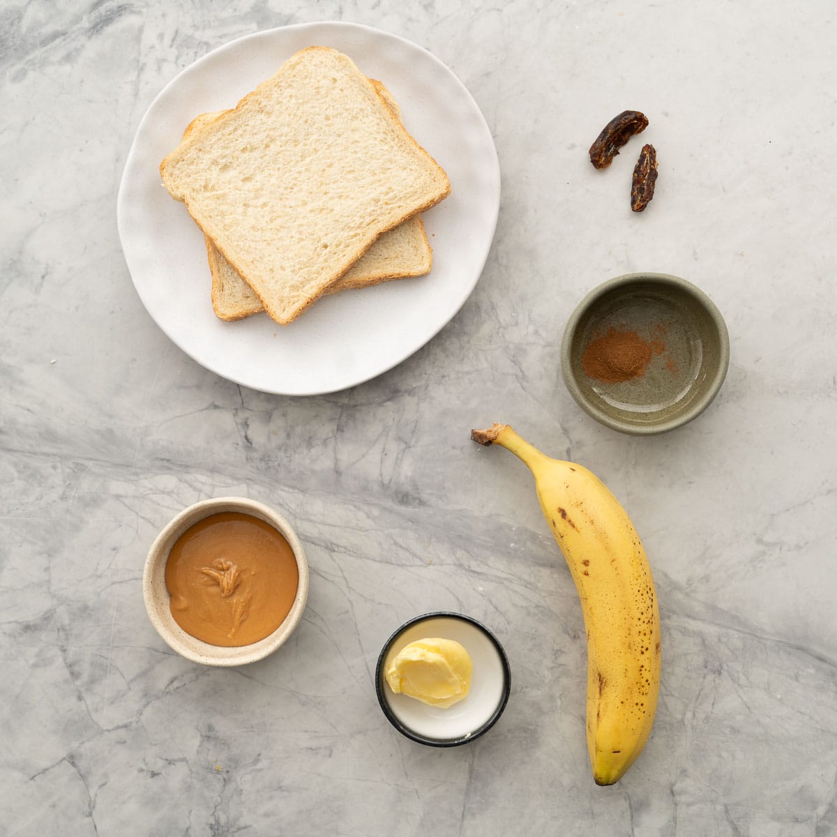 All the ingredients laid out on the bench to make the peanut butter banana sandwich