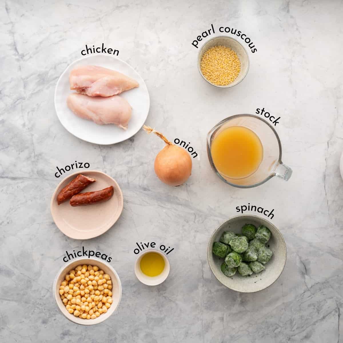 All the ingredients to make the Chicken Couscous, laid out on the bench