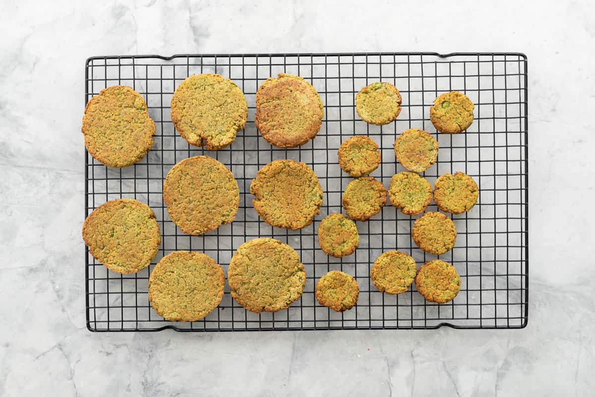 Cooked chickpea patties on cooling tray.