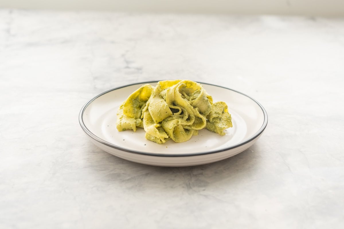 A portion of Avocado pasta served on a plate.