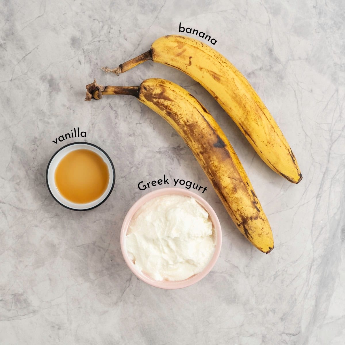 Ingredients for banana yogurt on bench top with text overlay.