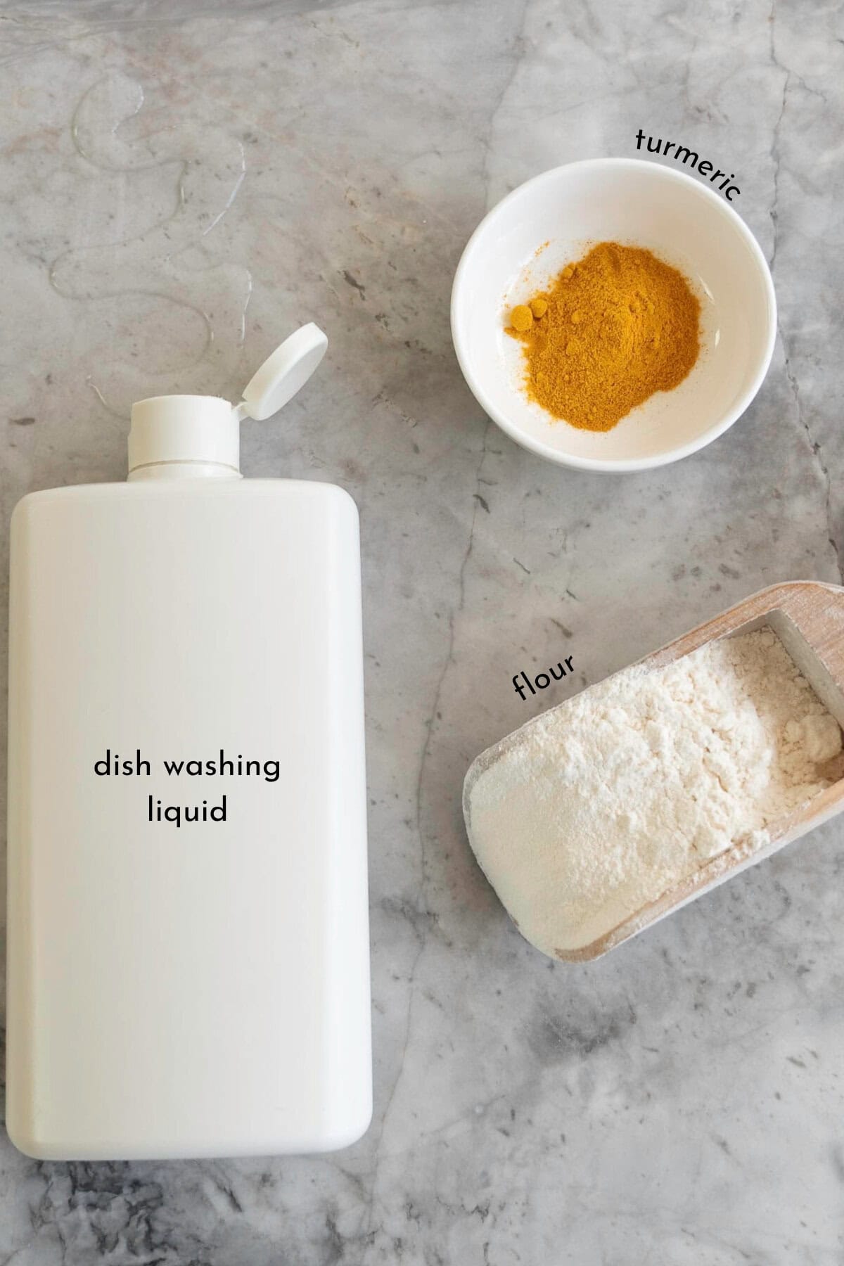 The ingredients to make no-bake playdough laid out on a counter top with text overlay.